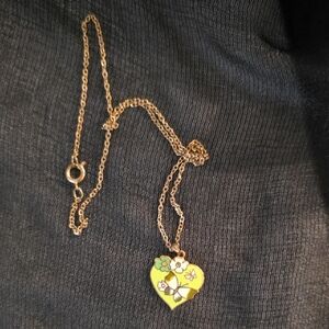 Elegant Gold Heart Necklace with Floral Design
